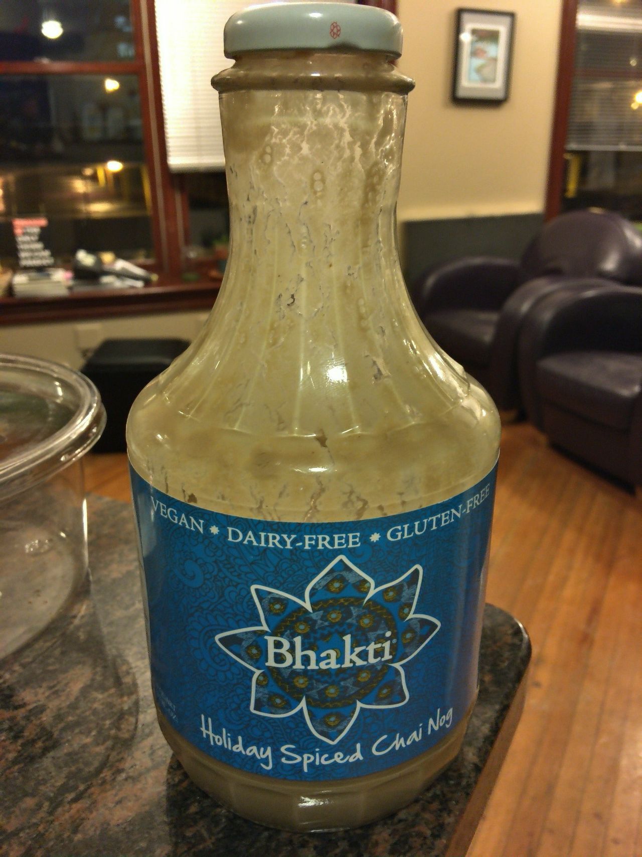 A partly finished bottle of Bhakti Holiday Spiced Chai Nog