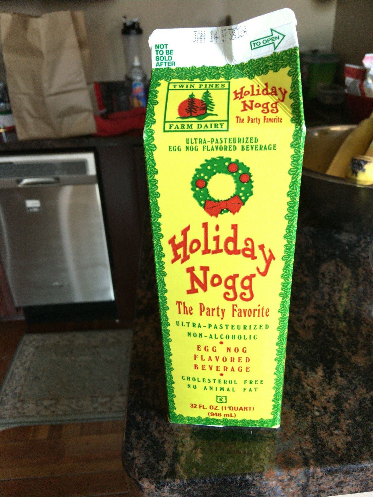 An opened carton of Twin Pines Holiday Nogg on a granite counter